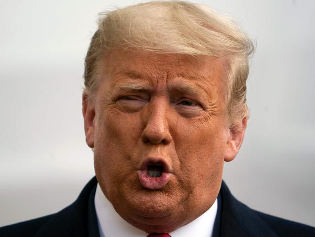 US President Donald Trump speaks to the press as he departs the White House in Washington, DC, on October 30, 2020. - Trump travels to Michigan, Wisconsin and Minnesota for campaign rallies. (Photo by ANDREW CABALLERO-REYNOLDS / AFP)