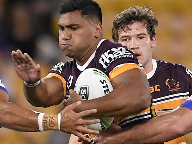 BRISBANE, AUSTRALIA - JULY 11: Tevita Pangai Junior of the Broncos takes on the defence during the round nine NRL match between the Brisbane Broncos and the Canterbury Bulldogs at Suncorp Stadium on July 11, 2020 in Brisbane, Australia. (Photo by Albert Perez/Getty Images)