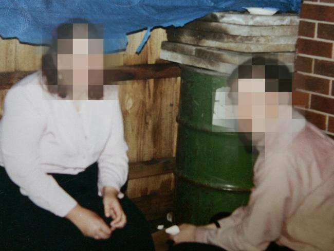 Copy picture of guest at a party with a green barrel in background which held the dismembered body of Edwina Boyle. Important notice please block out faces in photo's not to be identified Supreme Court Order. Picture: Trezise Paul