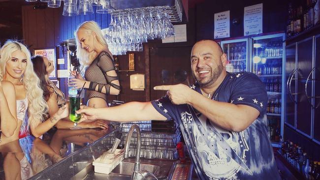 Jimmy 'Vegas' Seoud, the new co-owner of strip club Toybox Showgirls in Surfers Paradise, Gold Coast with staff and venue models