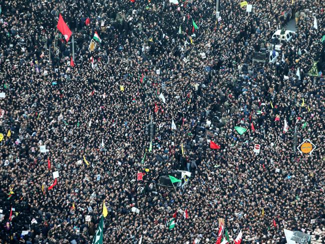 Iranians gather in the northeastern city of Mashhad to pay homage to Qassem Soleimani. Picture: AFP