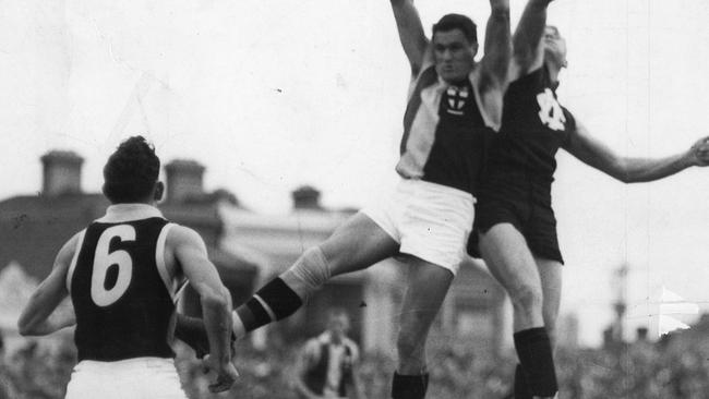 Ballarat’s Paul Dodd (6) in action in 1962 as he waits for St Kilda’s Alan Morrow and Carlton’s Russell Crow to contest the ball. Picture: Herald Sun.