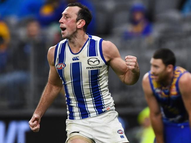 PERTH, AUSTRALIA - JULY 12: Todd Goldstein of the Kangaroos celebrates a goal during the 2021 AFL Round 17 match between the West Coast Eagles and the North Melbourne Kangaroos at Optus Stadium on July 12, 2021 in Perth, Australia. (Photo by Daniel Carson/AFL Photos via Getty Images)