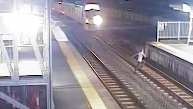 This man at Altandi was seen sprinting across the tracks, seconds before the train pulled up. Picture: Queensland Rail