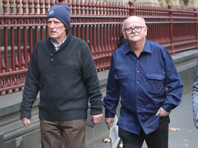 Rob Ashlin(right) arrives for the Greg Lynn court case at the Supreme Court of Victoria. Picture: David Crosling