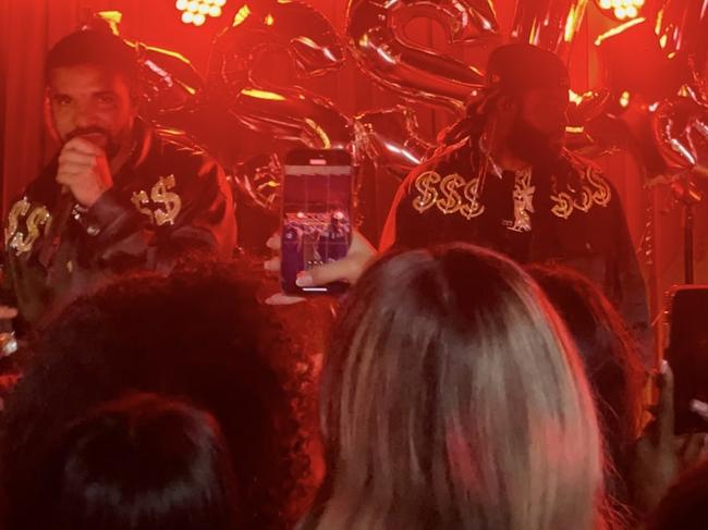 Drake on stage with PARTYNEXTDOOR at The Caterpillar Club in Sydney.