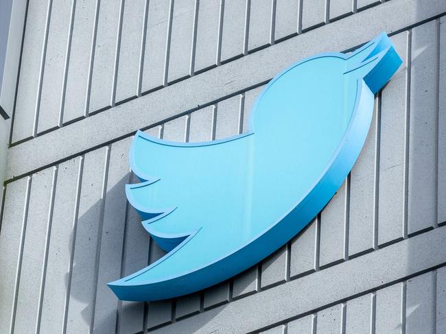 The Twitter logo is seen on a sign on the exterior of Twitter headquarters in San Francisco, California, on October 28, 2022. - After months of controversy, Elon Musk is now at the head of one of the most influential social networks on the planet, whose "tremendous potential" he has promised to unleash. (Photo by Constanza HEVIA / AFP)