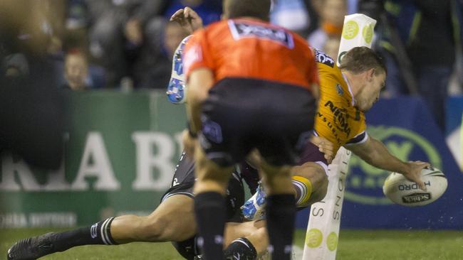 Corey Oates finishes off Cronulla. (AAP Image/Craig Golding)