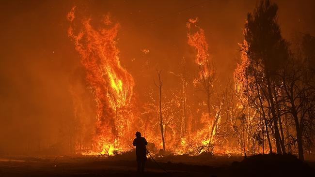 Queensland Fire and Emergency Services are battling to control a bushfire near Beerwah on the Sunshine Coast. Picture: QFES