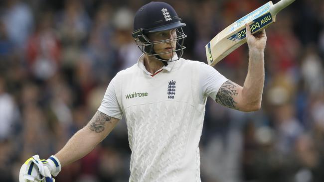 England’s Ben Stokes holds up his bat to the crowd after his huge knock