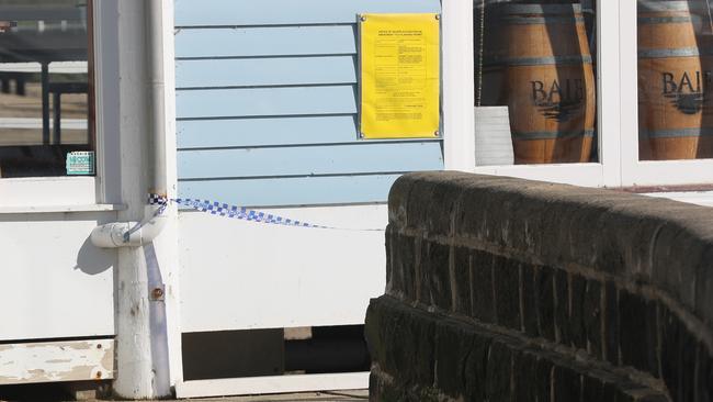 At the Heads restaurant in Barwon Heads was closed following a boating accident on Saturday morning, with police tape surrounding it. Picture: Alan Barber