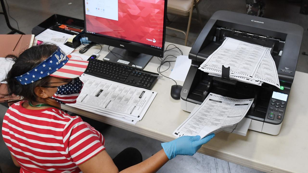 A Clark County election worker scans mail-in ballots at the Clark County Election Department on October 20, 2020 in North Las Vegas, Nevada. Picture: Ethan Miller/Getty Images/AFP