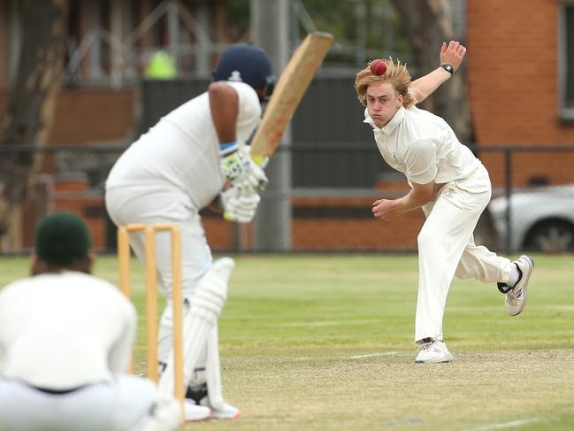 Spotswood left-armer Max Buck sends one down. Picture: Hamish Blair