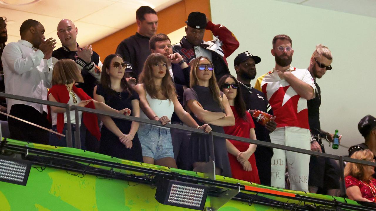 (L-R) Ed Kelce, Ashley Avignone, Alana Haim, Ross Travis, Taylor Swift, Este Haim, Danielle Haim and Donna Kelce attend Super Bowl. Picture: Getty Images