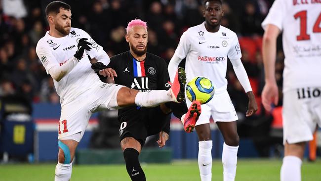 Neymar, centre, controls the ball against Montpellier in Ligue 1 Picture: AFP