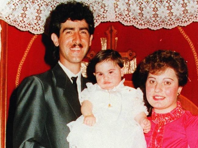 Ljube Velevski and his wife Snezana at the christening of their eldest daughter Zaklina.