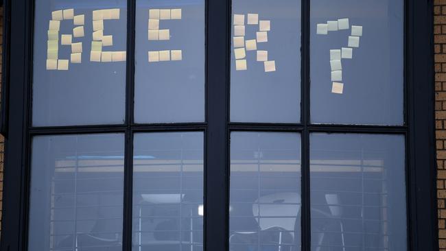 Students from Glasgow University put signs in the windows of the student accommodation at Murano Street student village in September after being placed under Covid restrictions. Picture: Jeff J Mitchell/Getty Images