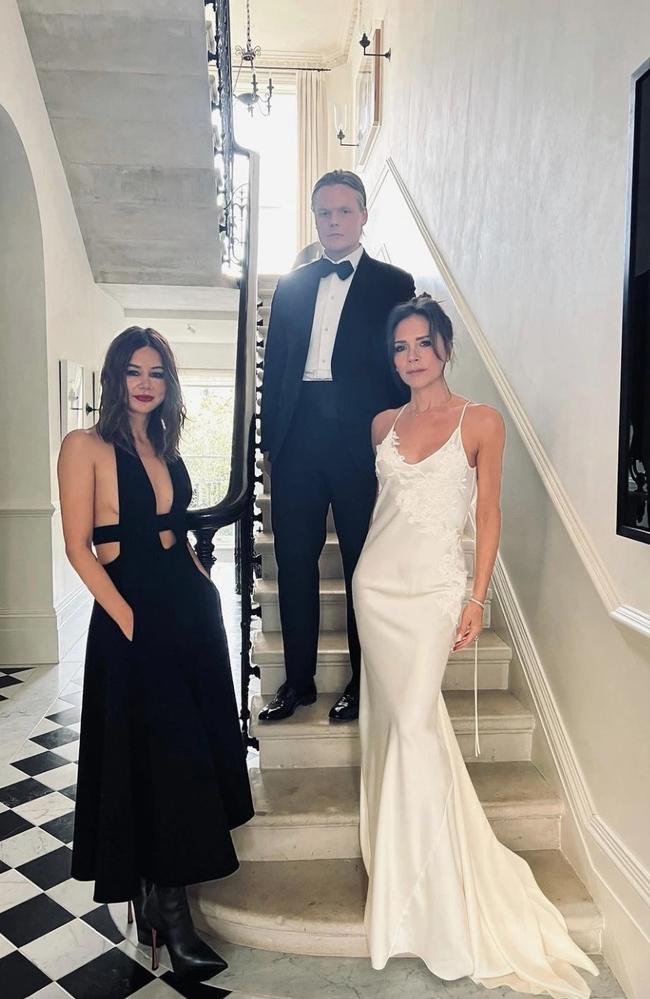 Victoria Beckham wears white gown to Vogue editor Edward