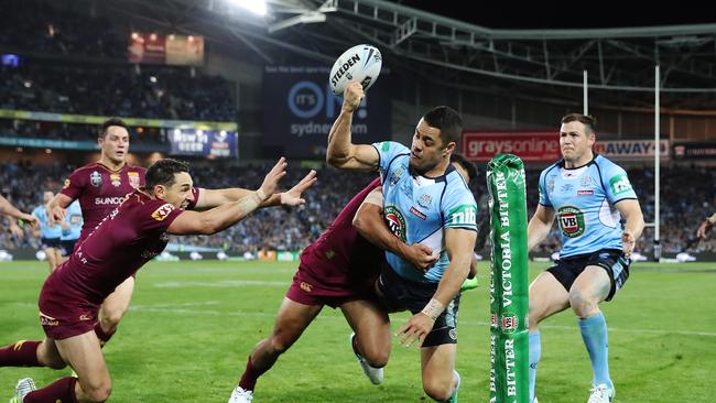 Jarryd Hayne is bundle in to touch after ignoring Brett Morris. Picture: Brett Costello