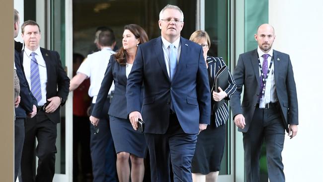 Scott Morrison arrives for the Liberal Party room meeting at Parliament House in Canberra.