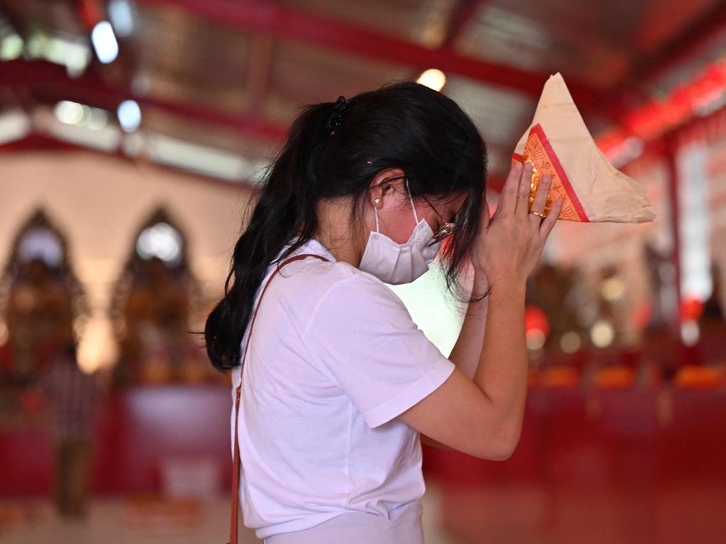 A woman prays at a temple in Jakarta. Picture: Adek Berry/AFP