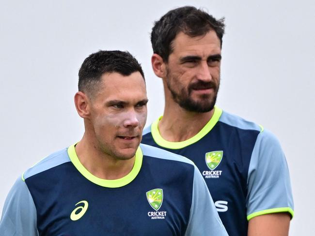 Australia's Scott Boland (L) and Mitchell Starc attend a practice session at the Galle International Cricket Stadium in Galle on January 26, 2025, ahead of the first Test cricket match between Sri Lanka and Australia. (Photo by Ishara S. KODIKARA / AFP)