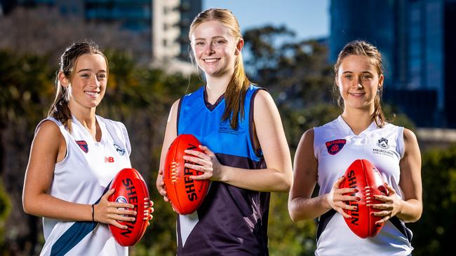 Junior female footballers will be taking part in the Herald Sun Shield. (L-R) Bella Boffa (17), Tylah Mills (17) and Amelia Kogler (18). Picture: Jake Nowakowski