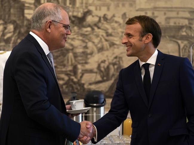 ‘Up until then, our relationship had been positive and friendly’ … maintaining smiles with French President Emmanuel Macron at G20 in Rome, October 2021.