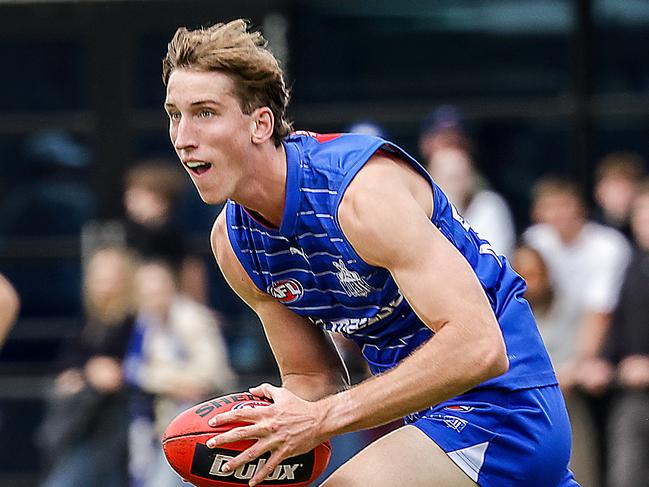 AFL. North Melbourne hold a simulation practice game at Arden St. Matt Whitlock takes possession of the ball going forward. Picture: Ian Currie