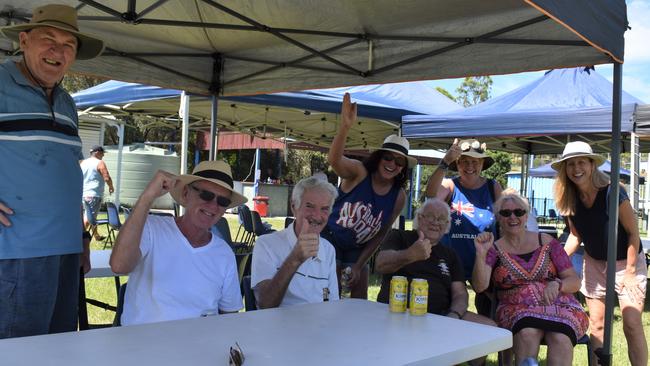 Bryan Benporath, Julie Chalmers, Martin Scurlock, Russ Parker, Sam Kemp, Julianne Ropret, Lyn Collett and Leonie Evans shouting "Aussie Aussie Aussie."