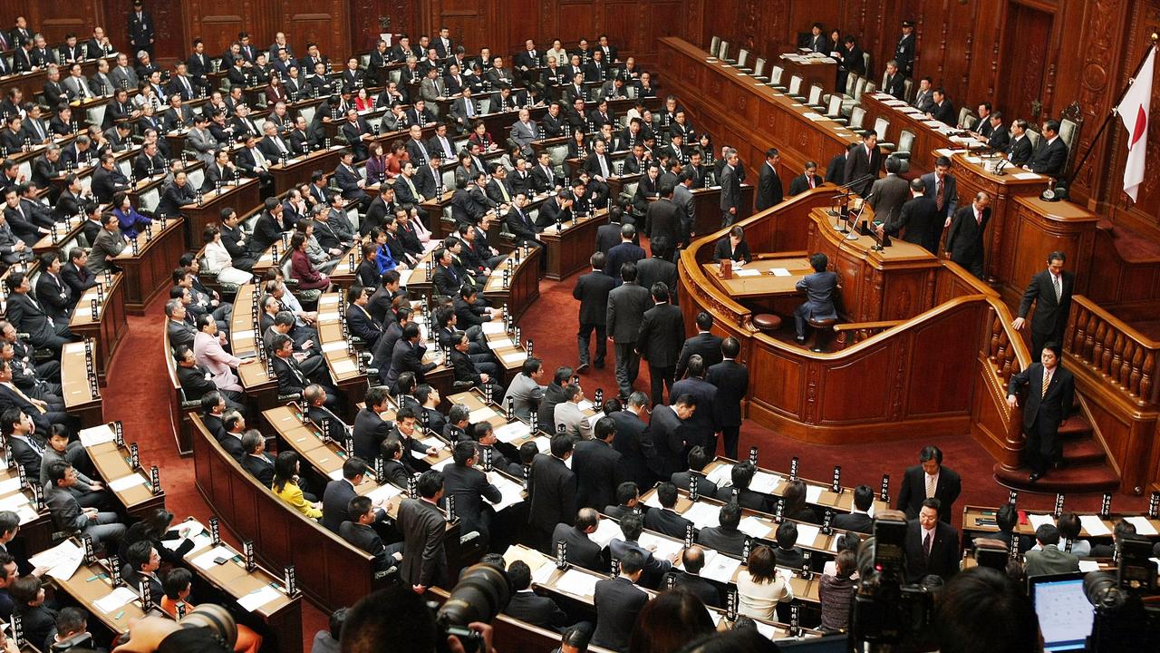 Upper house members vote during the full assembly. Picture: Junko Kimura/Getty Images