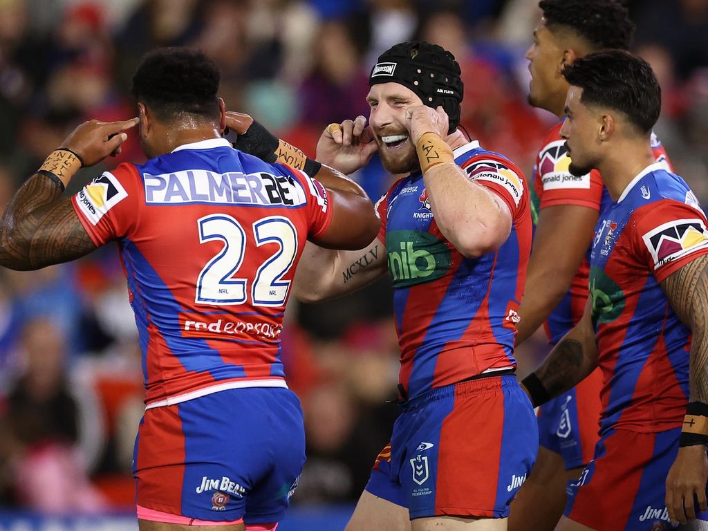 Jackson Hastings of the Knights celebrates a try. (Photo by Cameron Spencer/Getty Images)