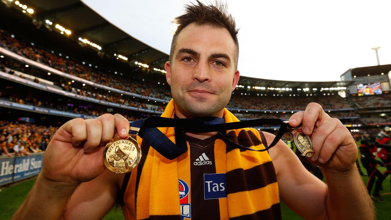 Brian Lake with the Norm Smith Medal after the 2013 premiership win. Picture: AFL Media