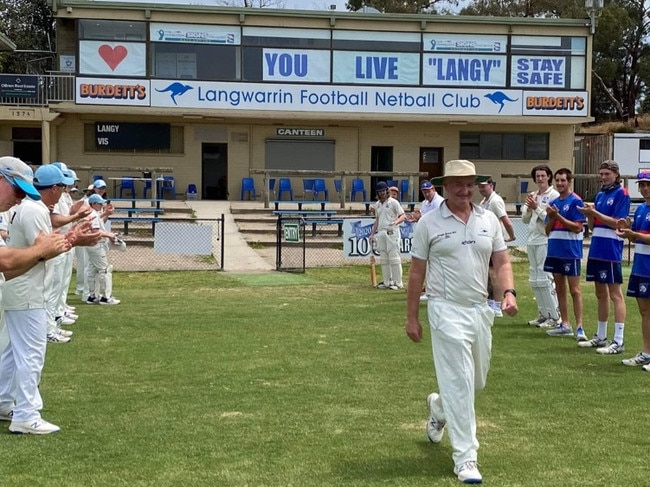 Simon McEvoy gets clapped on to the ground for his 400th match for Langwarrin.