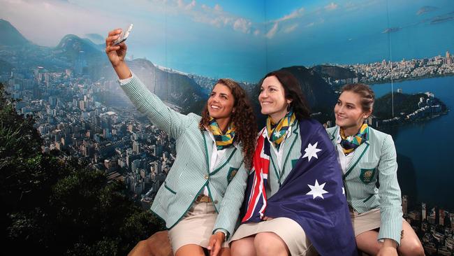 Jess Fox, Meares and Melissa Wu prepare for the Flag Raising ceremony at the 2016 Olympics. Picture: Phil Hillyard