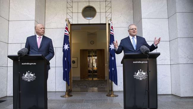 Prime Minister Scott Morrison with the Home Affairs Minister Peter Dutton during a press conference discussing new cyber security plans at Parliament House in Canberra. Picture: NCA NewsWire /Gary Ramage