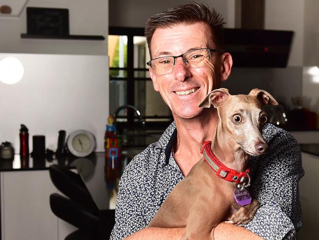 Wayne McDonald with Bella is happy to finally be home after the 2019 floods. Picture: Shae Beplate.