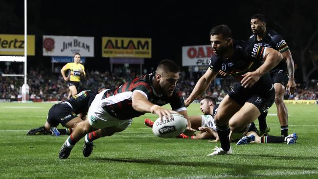 SYDNEY, AUSTRALIA - APRIL 26: Corey Allan of the Rabbitohs scores a try during the round 7 NRL match between the Penrith Panthers and the South Sydney Rabbitohs at Panthers Stadium on April 26, 2019 in Sydney, Australia. (Photo by Mark Metcalfe/Getty Images)