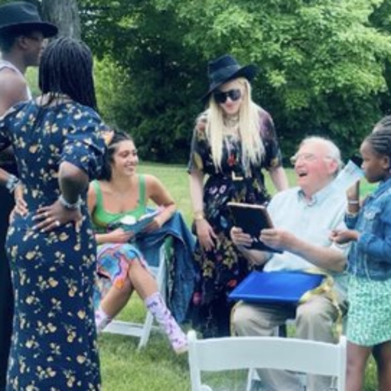 Madonna and her children celebrate with her dad.