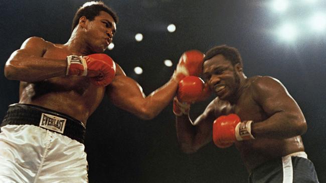 Ali and Joe Frazier fight in a 12-round non-title fight at Madison Square Garden in New York, 1974.