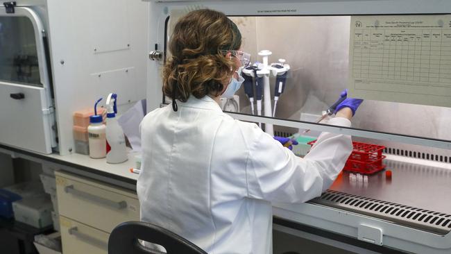 A scientist at work in Oxford, England. Picture: Steve Parsons/WPA Pool/Getty Images