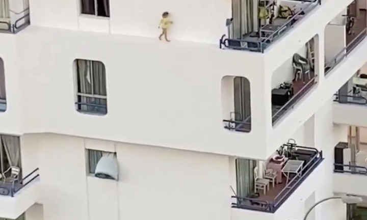 Chilling Moment Young Girl Walks Along Balcony Edge While Mum Showers