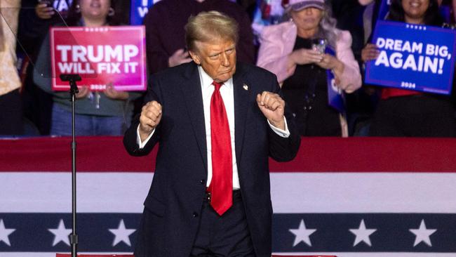 Former US President and Republican presidential candidate Donald Trump dances at the end of a campaign rally. Picture: AFP