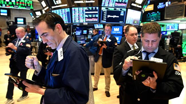 Traders work at the New York Stock Exchange. Picture: AFP