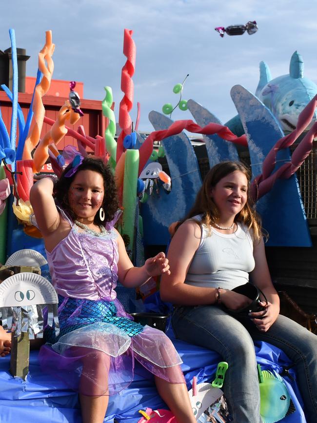 Mount Fox State School students throwing candy to the crowds. Photographs from the Maraka Festival Street Parade around the Ingham central business district on Saturday. In an ‘Under the Sea’-themed celebration of all things Hinchinbrook, school students, community organisations, emergency responders and contestants vying for the prized Queen and Princess titles paraded around Rotary Park in the centre of the town. Picture: Cameron Bates