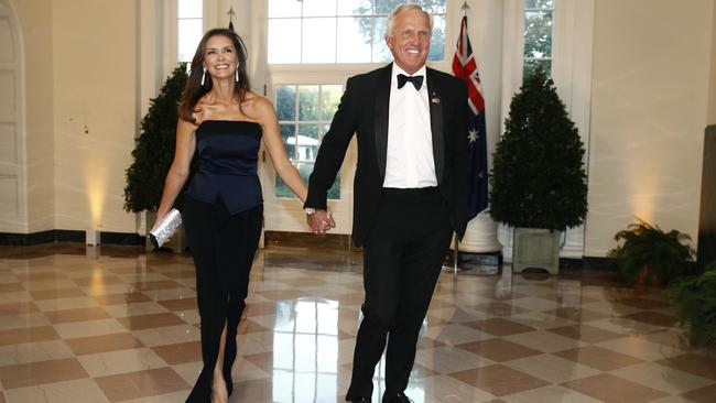 Golfer Greg Norman, right, and wife Kirsten Kutner arrive to attend the state dinner under the stars in the White House rose garden. Picture: AP