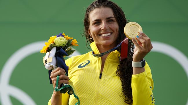 A gold medal puts a golden smile on Jess’ face. Picture: Getty Images