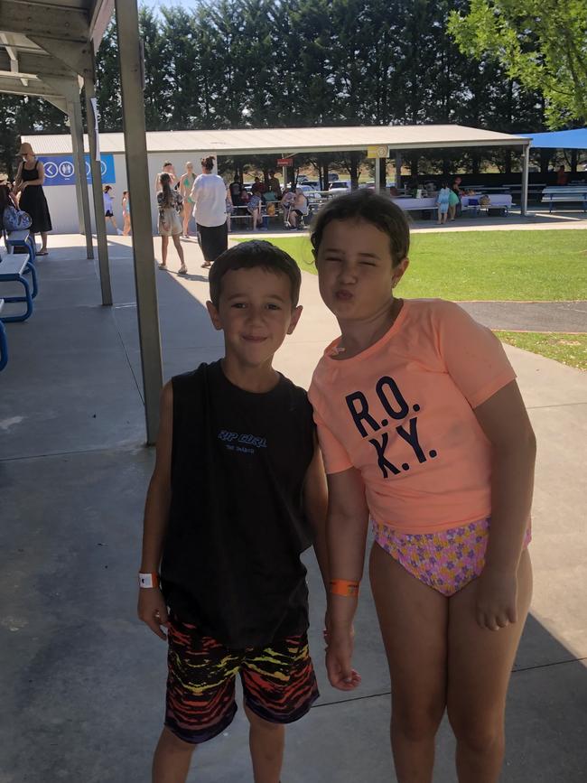 Spencer, 8 and Scarlett, 10, get ready for some fun in the summer sun in Whittlesea at Funfields. Picture: Stephanie Ashworth, Whittlesea.