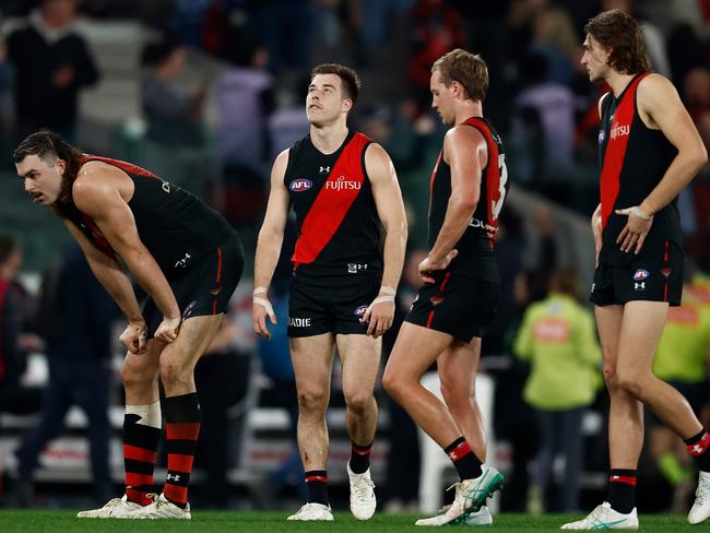 MELBOURNE, AUSTRALIA - AUGUST 10: Zach Merrett of the Bombers looks dejected after a loss during the 2024 AFL Round 22 match between the Essendon Bombers and the Gold Coast SUNS at Marvel Stadium on August 10, 2024 in Melbourne, Australia. (Photo by Michael Willson/AFL Photos via Getty Images)