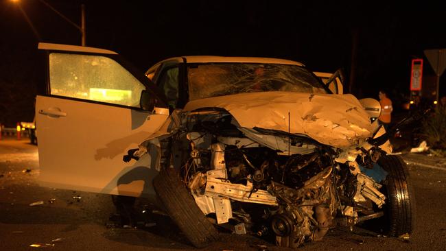 The white Suzuki Swift in the aftermath of a serious crash in Woombye.